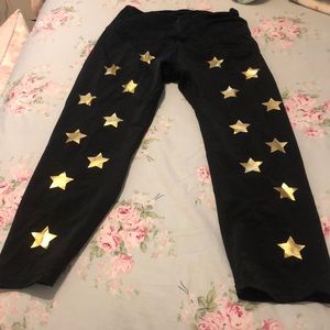 Black leggings with gold stars